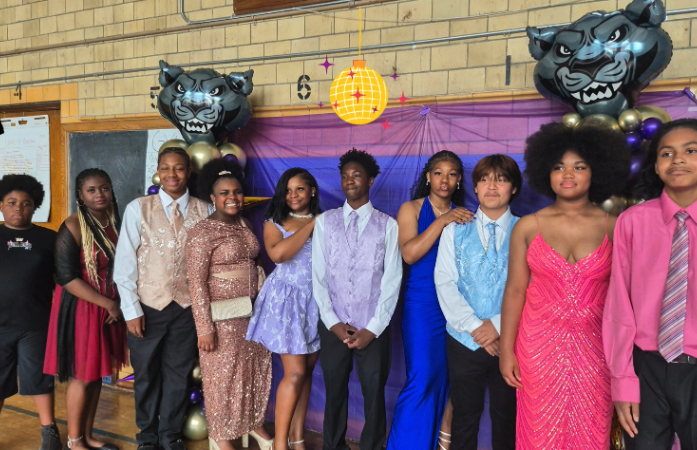 8th grade students dressed for dance